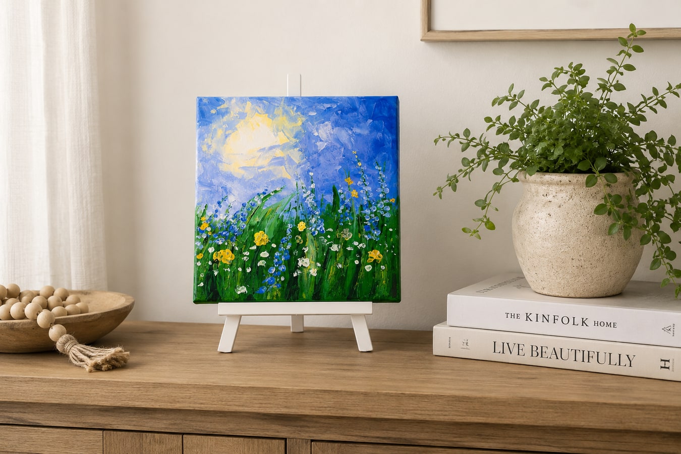 Garden Vacation painting displayed on a small tabletop easel