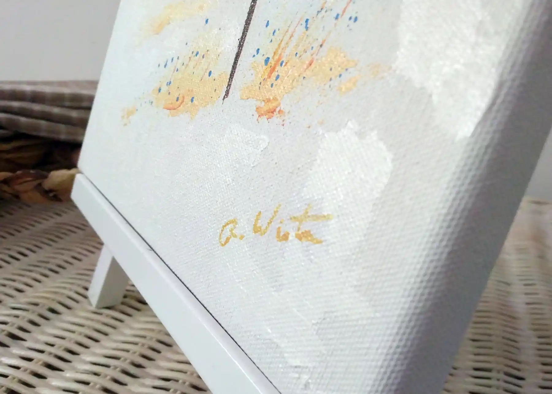 close up of robert winton signature on painting