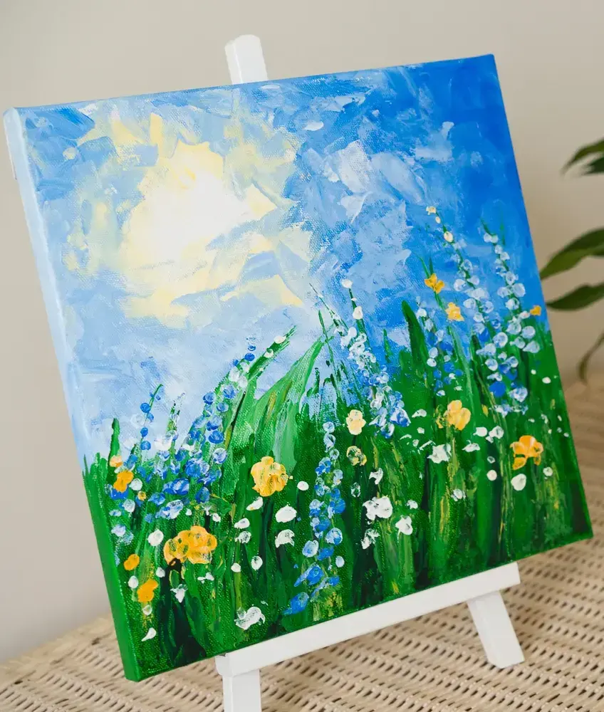 Original canvas painting in the impressionistic style of spring grass and flowers on a windy day